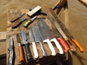 Our knife collection! A couple of machetes for contruction and exploring the jungle and then some smaller knifes for kitchen and fishing. The two huge white-handled knifes were Peycho and Mishas knifes, more for fun. Looks dramatic, but hey, this is the accumulated knifes among 3 guys.